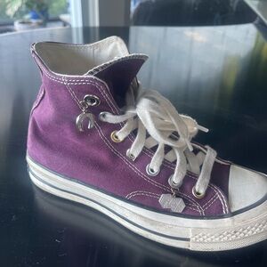 Luck Charm Converse  70 High “Luck Charm”sneakers in Orchid Abyss colorway.